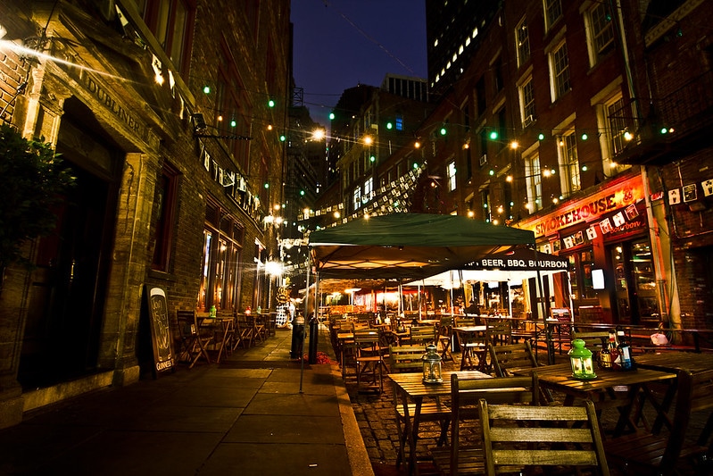 Stone Street is one of the top cute places to take pictures in NYC