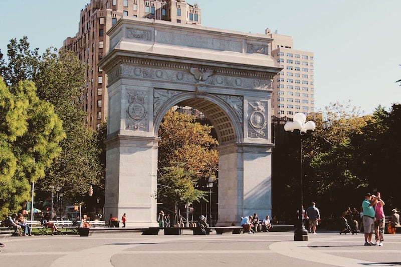 traveler visiting the Washington Square Park arch during a 4 day itinerary for New York City