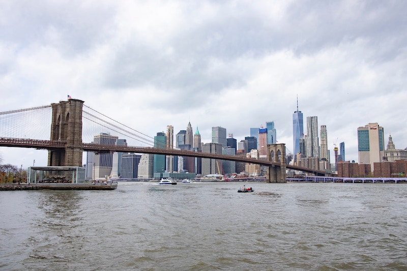 photographing the Brooklyn Bridge from the water